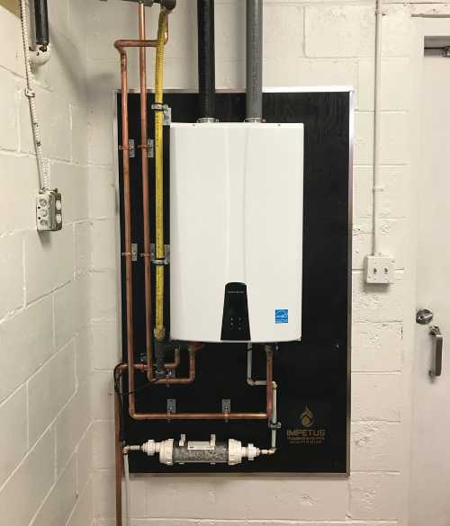 Navien tankless heater installed by Impetus Plumbing & Heating